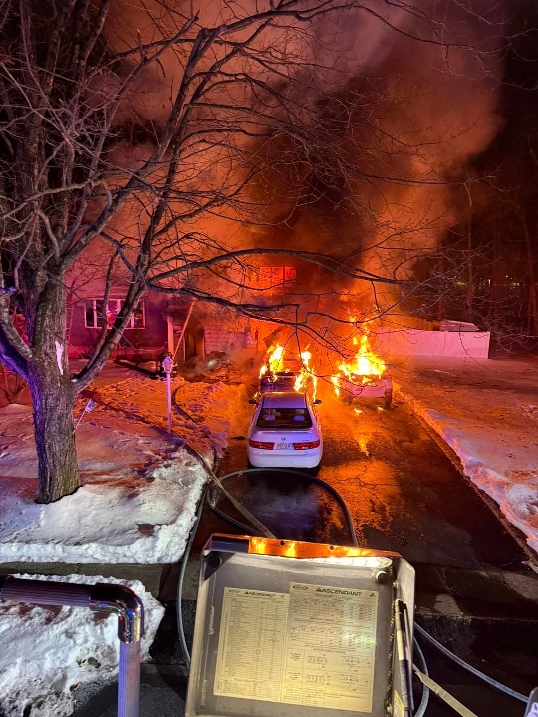 The family's cars were not spared in the Valentine's Day blaze. (Parsippany Troy-Hills Fire District 6)