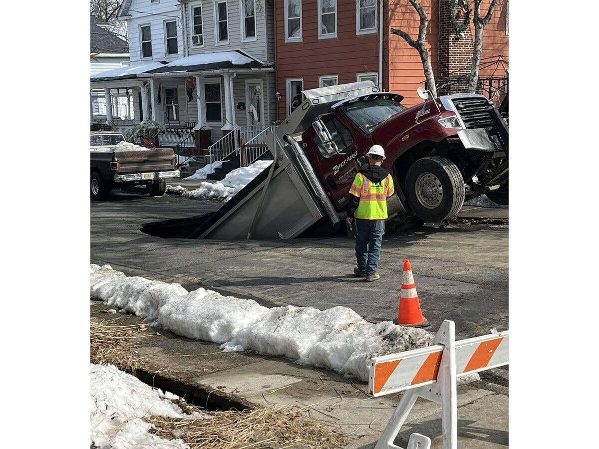 The state of emergency was declared hours after a dump truck was swallowed by a gaping sinkhole.