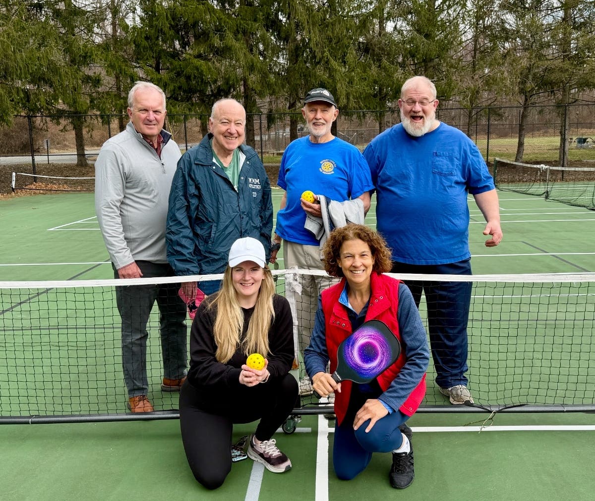 Rotary members (front) Alexandra Henry Traut and Amalia Duarte, with (rear) Neil Henry, Fred Corona, Jim Thomas, and Tony Pettine.