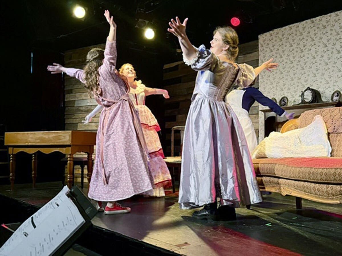 The March sisters perform an act of sisterly bonding.