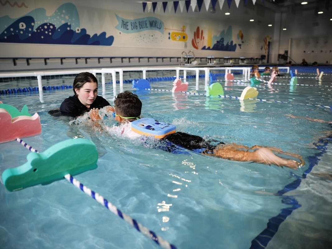 Lessons are available for children ages 3 months to 12 years. The school said its curriculum was written by Olympian Tom Dolan and former American record holder Chris DeJong.