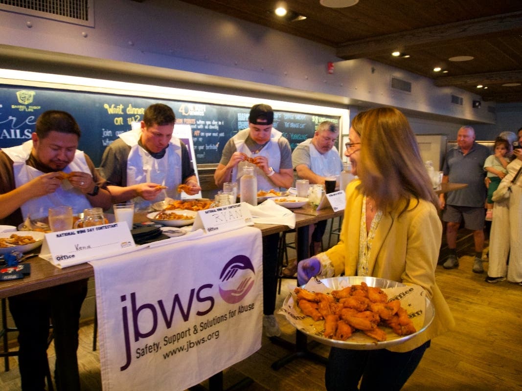 The contest celebrated National Chicken Wing Day while raising awareness and support for JBWS, originally founded as Jersey Battered Women's Service.