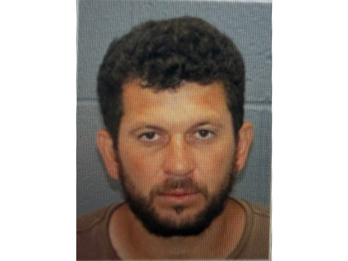 Eswaur Herrera-Garcia is charged with with two counts of aggravated assault, two counts of terroristic threats, possession of a weapon, unlawful possession of a weapon, and endangering a child.