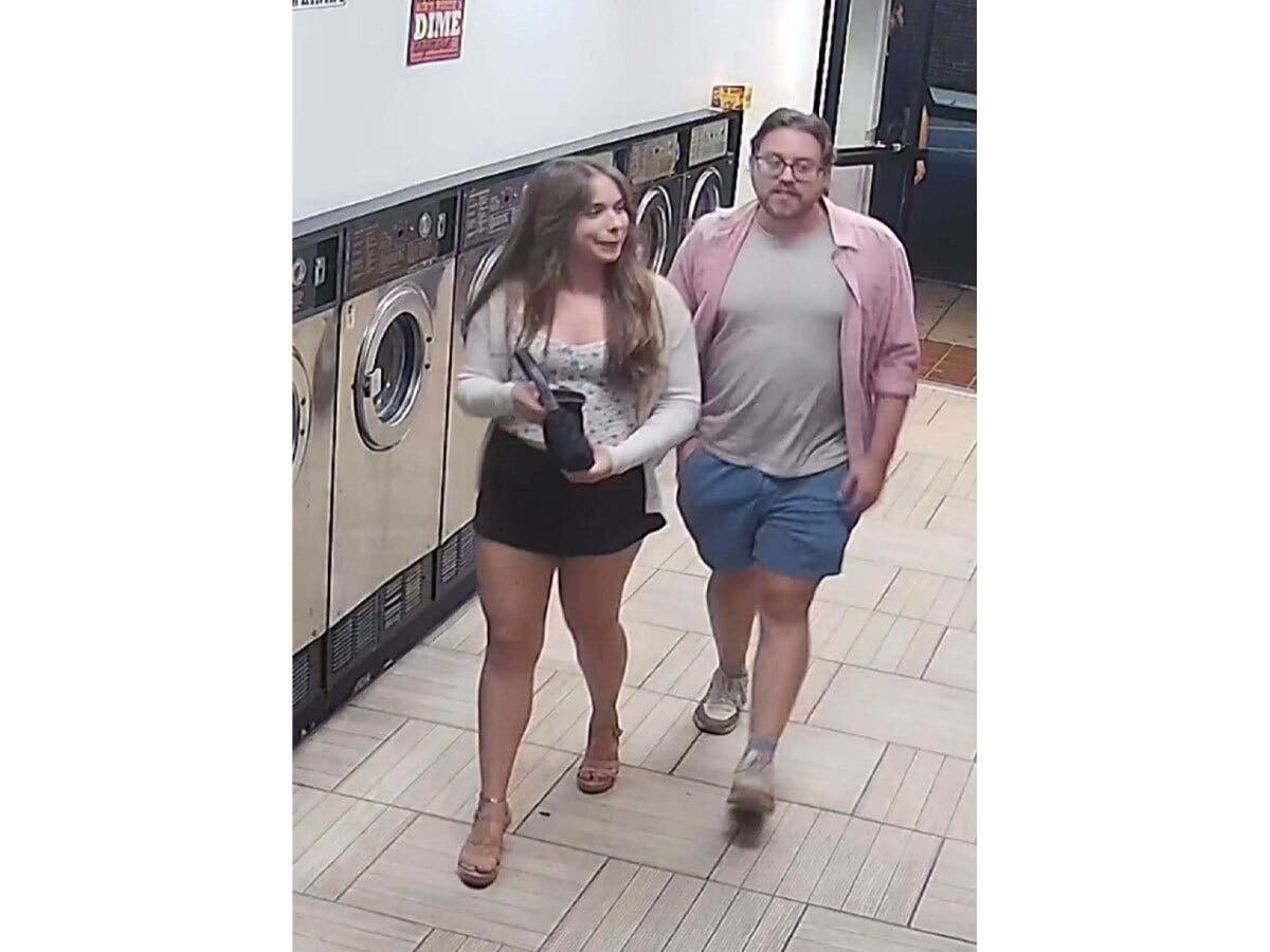 Police are looking to identify this couple, saying that the man on the right destroyed two parking safety devices.