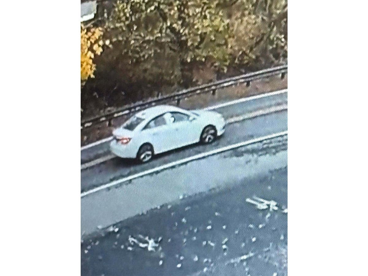 The suspect car is described as a white sedan displaying a Pennsylvania license plate, authorities added.