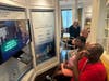 Attendees watching the Dr. Warees Majeed's Voices for Humanity episode on Scientology TV