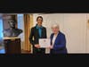 Sue Taylor, President of the Church of Scientology, on behalf of Hon. Eleanor H. Norton of the House of Representatives, presents Thalia Ghighlia, Faith Liaison to Drug Free World, with the Certificate of Special Congressional Recognition for her work.
