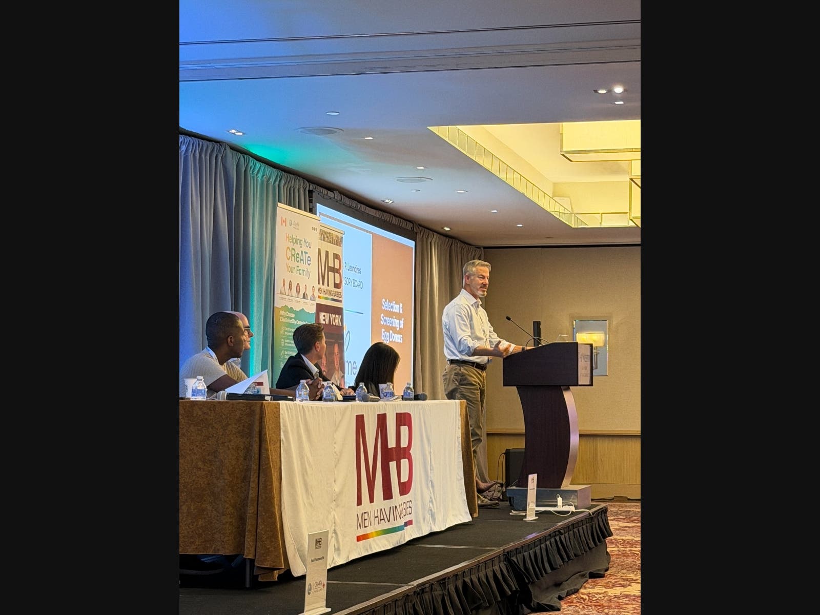 Dr. Mark Leondires, founder and medical director of Illume Fertility, speaks during the Medical Aspects of Surrogacy Panel at the Men Having Babies New York Conference.