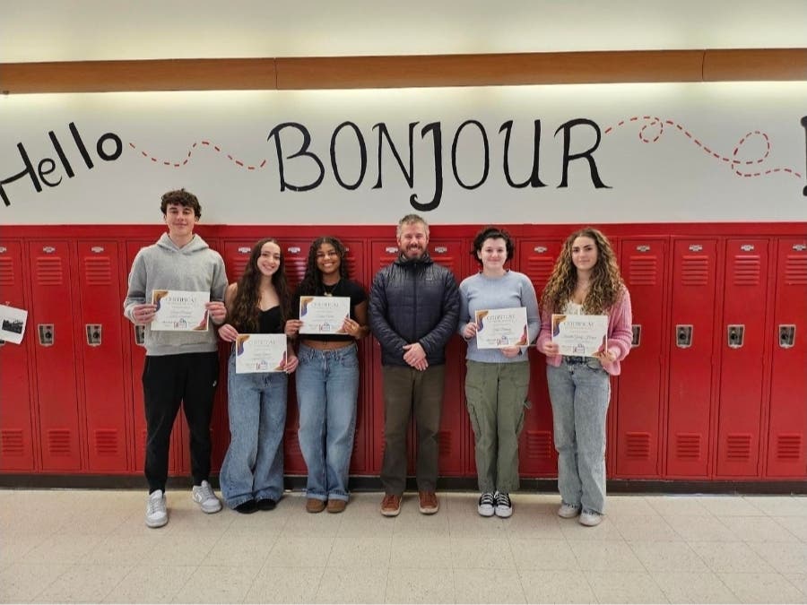 Milford High junior Catie Delaney, along with a group of other students, including Sophia Coelho, Emily Garcia, Isabella Grady-Harper, Fiona Lentini, and Lucas Richard, were named award winners in a national French education contest.