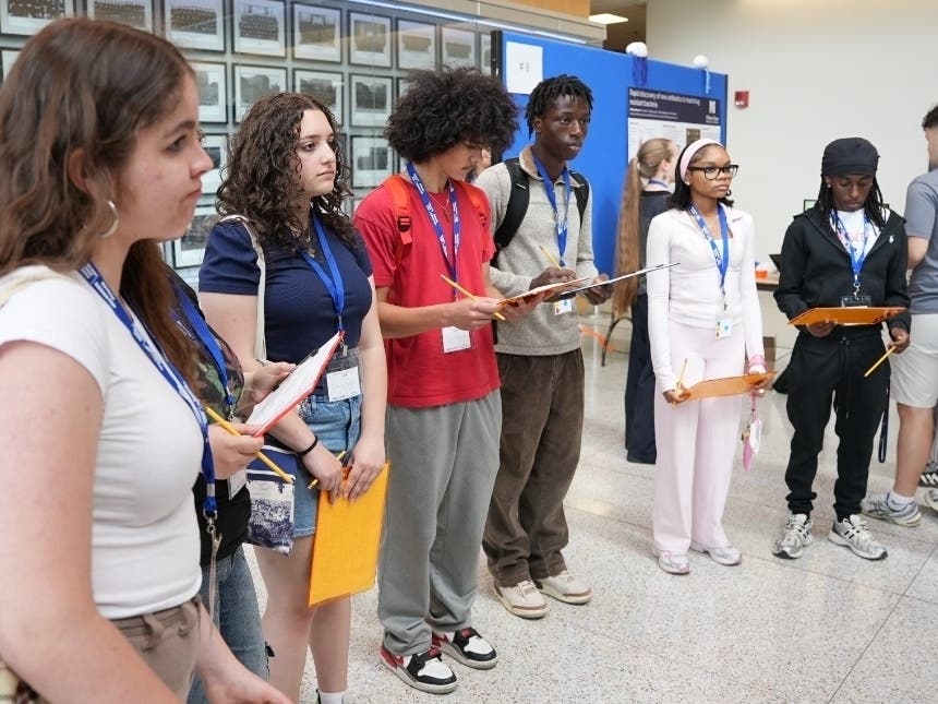 Nearly 50 WPS high school students evaluated research presentations from graduate students and postdoctoral scholars during the annual Reverse Science Fair on Wednesday.