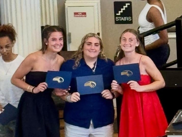 Bella LoScerbo, Katelyn Kearnan, and Avalina DiGiallonardo were recognized by the Massachusetts Interscholastic Athletic Association as representatives of the Milford High School community during a ceremony at Faneuil Hall. 