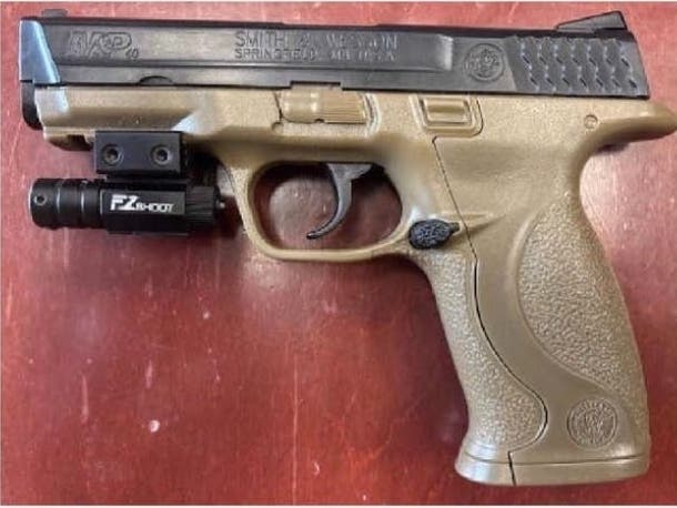 A 24-year-old Florida man is facing charges after Milford police said he brandished what was later identified as a BB gun during a dispute with a juvenile outside a Main Street 7-Eleven.