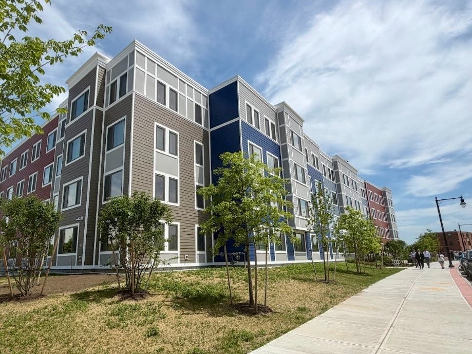 Worcester housing officials and developer Trinity Financial cut the ribbon Friday on the first phase of The Phoenix at Curtis, marking a major step in the redevelopment of the former Curtis Apartments.