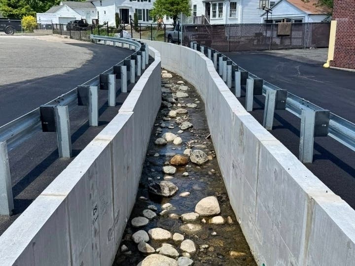 A flood-control project along Godfrey Brook has been completed after months of work, town highway officials said Friday.