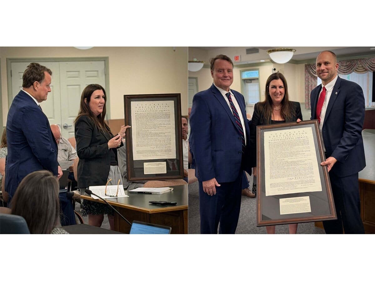 State Rep. Hannah Kane (R - 11th Worcester) and state Sen. Michael Moore (D-2nd Worcester) delivered a framed reproduction of the Declaration of Independence during Tuesday's Select Board meeting.