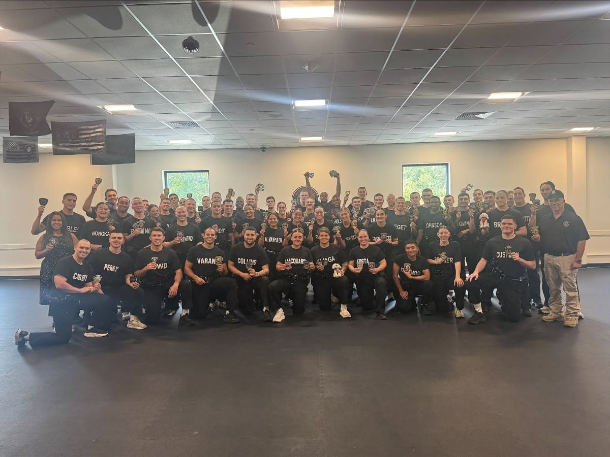 The Massachusetts Municipal Police Training Committee’s Marlborough 2nd Recruit Officer Course collected police patches, trading cards, stuffed animals and challenge coins from recruits’ hiring departments for Mia Johnson.
