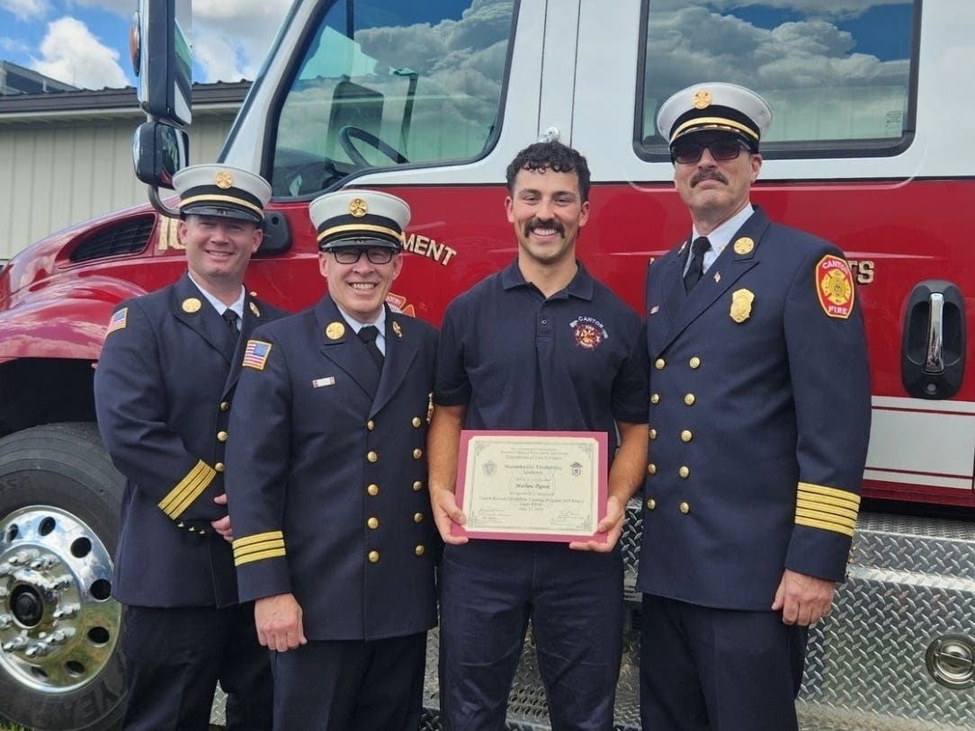 Canton Fire Department Deputy Chief Francis Walsh, Deputy Chief William Morgan, Firefighter Mathew Pigeon and Chief Jamie Meier (L-R) posed at the Massachusetts Fire Academy’s Career Recruit Firefighting Training Program graduation ceremony.