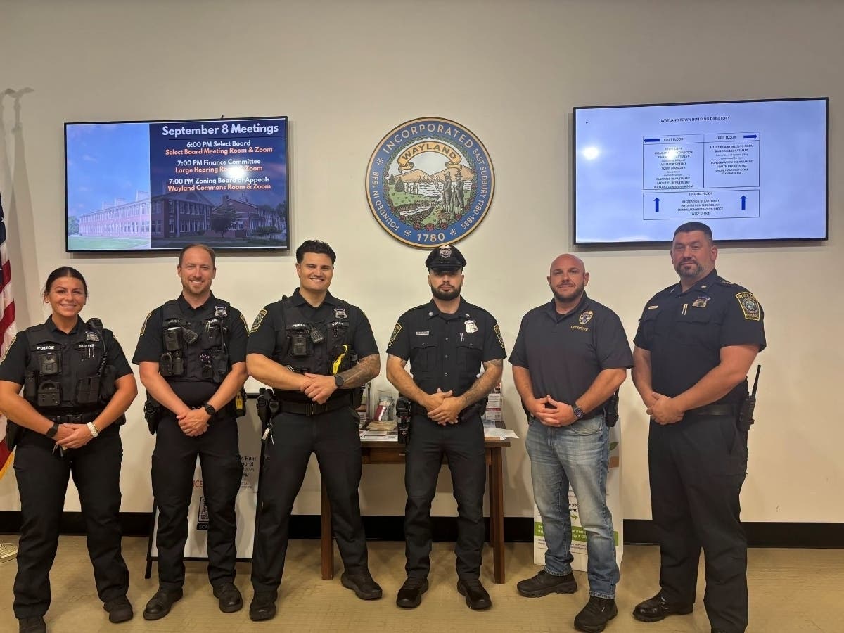 Officer Isaque Barcelone was sworn in before the Wayland Select Board on Tuesday at the Wayland Town Building.