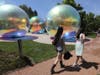On Wednesday June 3, 2026, artists put the finishing touches Wednesday on Evanescent, the immersive bubble-inspired sculpture installation now dubbed “Shimmering Summer” at the Chicago Botanic Garden. Show opens Saturday. 
