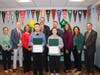 Eric Zhong and Kate Herrnstein are congratulated by Ward Melville and Three Village staff. 