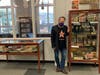 Curator Greg Fasolino at his show “Creepy Collectibles from Horror’s Golden Age” at Huntington Public Library