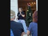 Representative Aimee Berger-Girvalo addresses rally crowd.