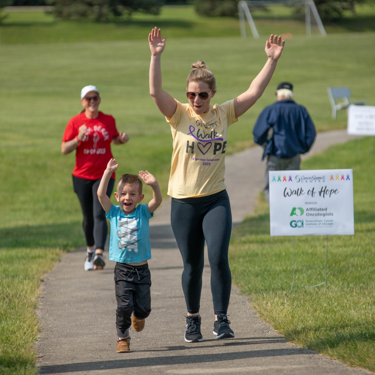 Families and children participate in the Cancer Support Center’s Walk of Hope & Survivor Celebration featuring kid-friendly activities, music, and community support.
