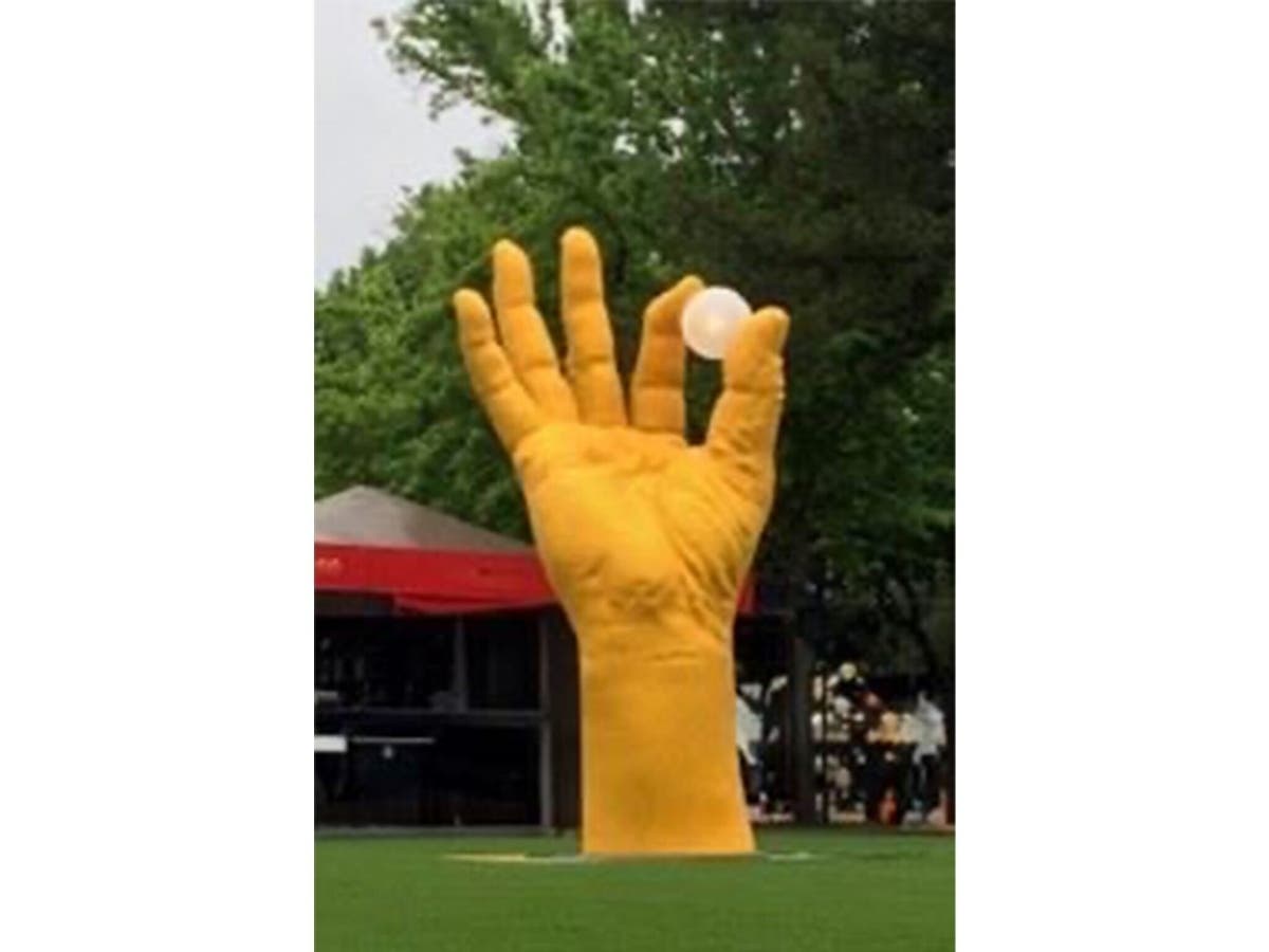 A stalled vision involving 13 sculptures reveals tensions over who decides what art belongs in public spaces. In the middle of the debate is an 18-foot tall, bright orange sculpture and its maker. 