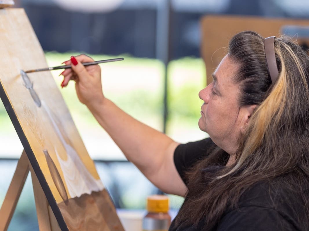 Denee Locke, a Becoming Independent artist. The program's artists develop confidence and artistic vision, as well as portfolios and commissions as working professiona