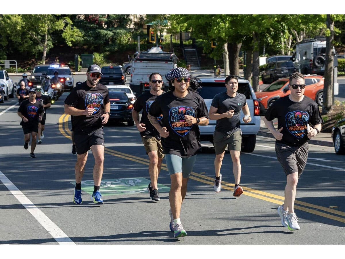 Walnut Creek police and city workers joined Concord, Pleasant Hill, and Danville in a torch relay that raised money and public support for Special Olympics athletes across Northern California.