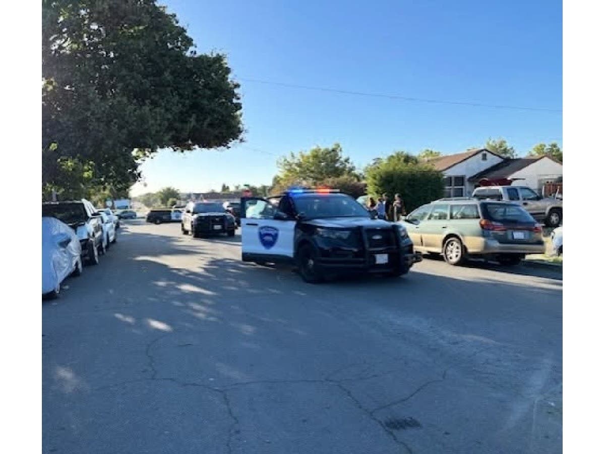 Suspect surrenders after police surround home following West 9th Street shooting.