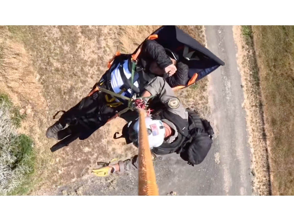 A man was airlifted from remote cliffs after receiving help from bystanders and rescue crews on Saturday.