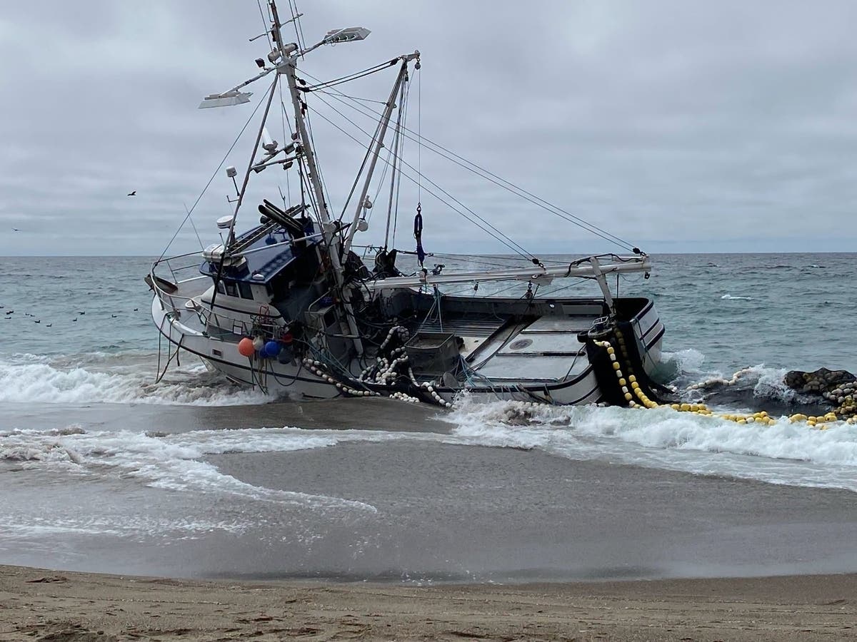 The Lake Bay ran aground Friday morning, prompting officials to close North Beach while authorities tried to remove the vessel carrying 1,000 gallons of diesel fuel.