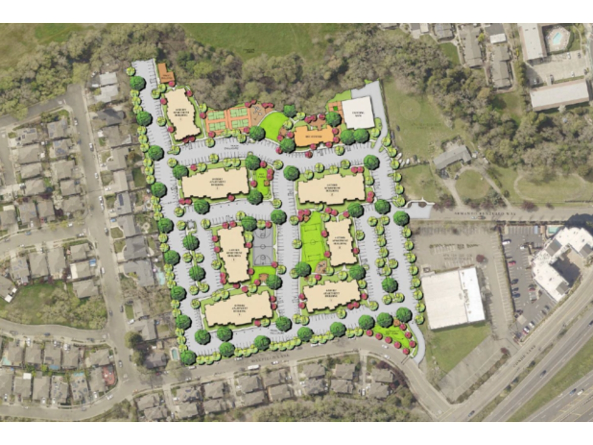 The proposal places seven four-story apartment buildings on the former Windsor Creek Elementary School site.