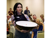 Abode associate director of housing services for Napa and Sonoma counties, Ashley Jacobsen, holds one of the prize vessels on Sept. 16, 2026 at the Abode Empty Bowls fundraiser, which helped raise a record $40,000 for services in both locales. 

