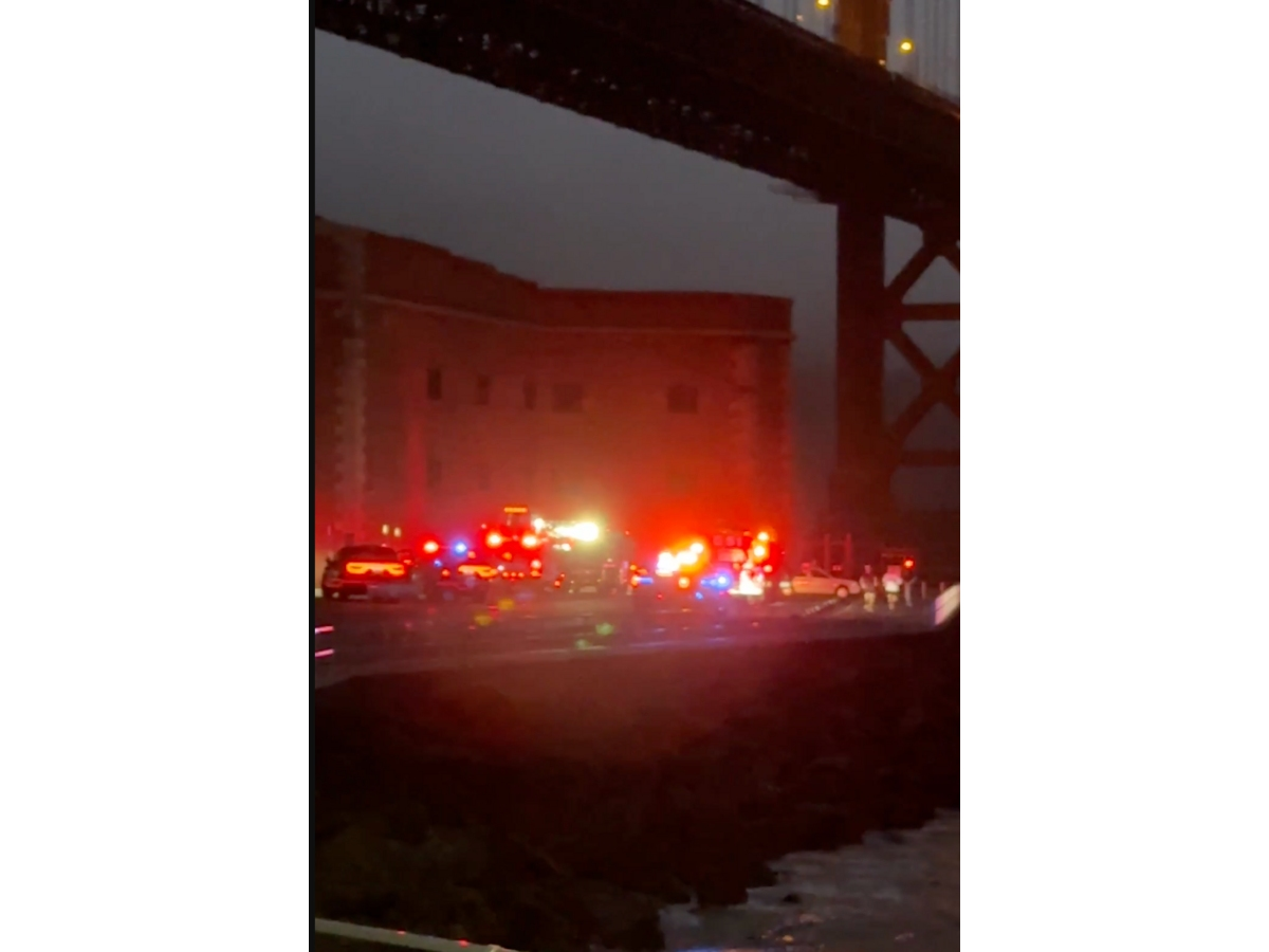 Emergency teams converged near the landmark as crews worked to bring passengers to safety.