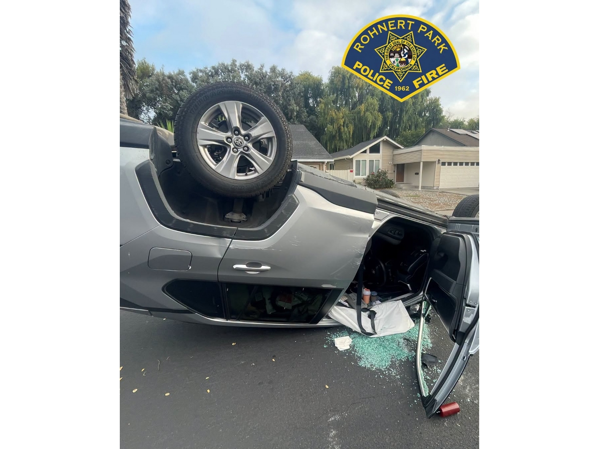 A Toyota RAV4 landed on its roof in the middle of Camino Coronado, closing the roadway.