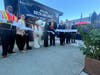 Delta executives and Sonoma County airport leaders Charisse Evans and John Stout (center) join Snoopy for a ribbon cutting celebrating new service between Santa Rosa and Salt Lake City on Tuesday, Oct. 6, 2026. 