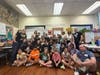 Students collaborate during a Safe Schools Ambassador Program activity focused on communication, inclusion, and positive peer leadership.