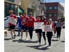 People joined in on the walk with red shirts and signs supporting anti-drunk driving.