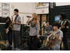 Jordan Siegel (second from left) and Ben Roth (second from right) were the key organizers of Rock For Mental Health.