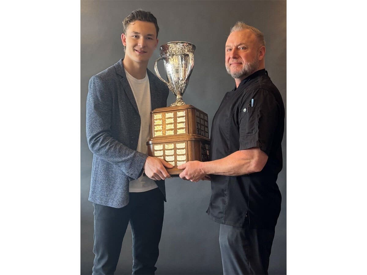 Matthew Schaffer and Executive Chef Gregg Lauletta with the trophy.