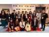 Oyster Bay High School’s TV production team with Erica Giglio Pac, Director of Fine, Performing, and Media Arts (far left), and Alex Dollin, TV production and media
teacher (far right).