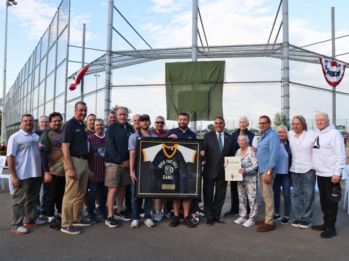 The dedication honors the late Farmingdale resident's contributions to youth sports, charity and community service