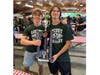 Locust Valley High School students Noah Mauldin and Jake Lamb accepted the Best Overall Band award on behalf of the school’s symphonic band.