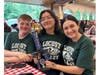Locust Valley High School students Chris Emmerich, Grace Araoz and Ava Yagudayev accepted the second-place trophy for the concert chorale.