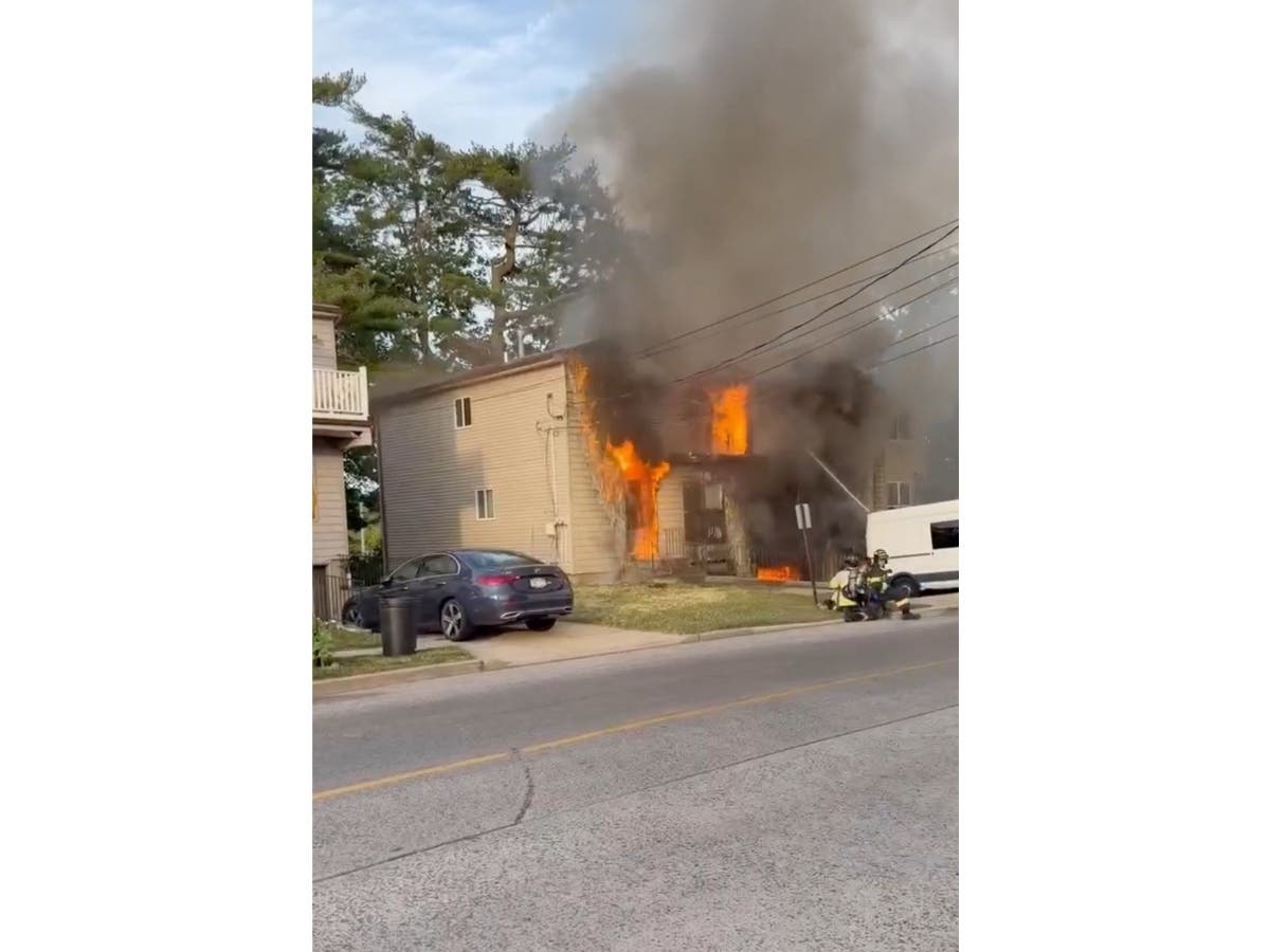 Neighbor Describes 'Incredibly Emotional' Manorhaven House Fire As Crews Battle Blaze From Exterior