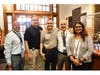 Dr. Sinha, Garden City Middle School Principal Mr. Ed Escobar, and the GCMS security team at the front of the building.