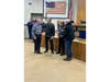3rd Assistant Chief Donald Leppla, left, 1st Assistant Chief Andrew Kelly, John Gordon, former Chief Thomas D’Arcangelo, Linda (Gordon) Golden, Ken Gordon, and 2nd Assistant Chief Joseph Palazzo following a presentation honoring the life-saving rescue.