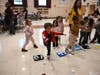 Prekindergarten students participate in a winter-themed “snowball” tossing activity that encouraged movement, teamwork and hand-eye coordination at Marion G. Vedder Elementary School.